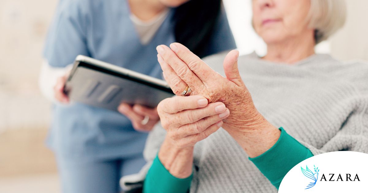 A caregiver provides in home care services to a senior with arthritis