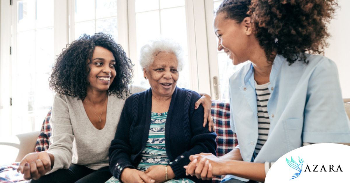 Caregiver talking to a family about Elderly Care